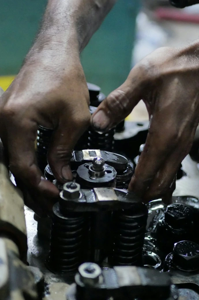 person holding black metal tool